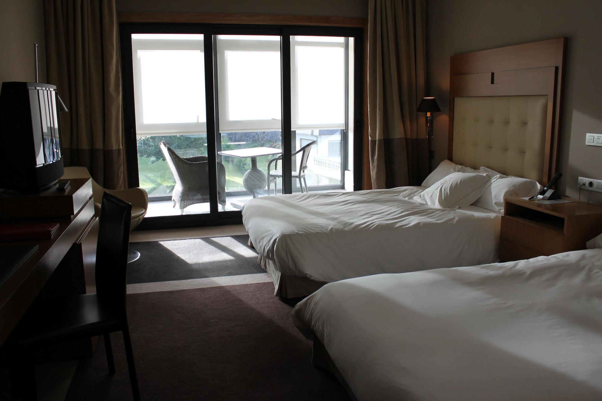 ויגו Pazo Los Escudos Hotel Spa & Resort מראה חיצוני תמונה A room at the hotel